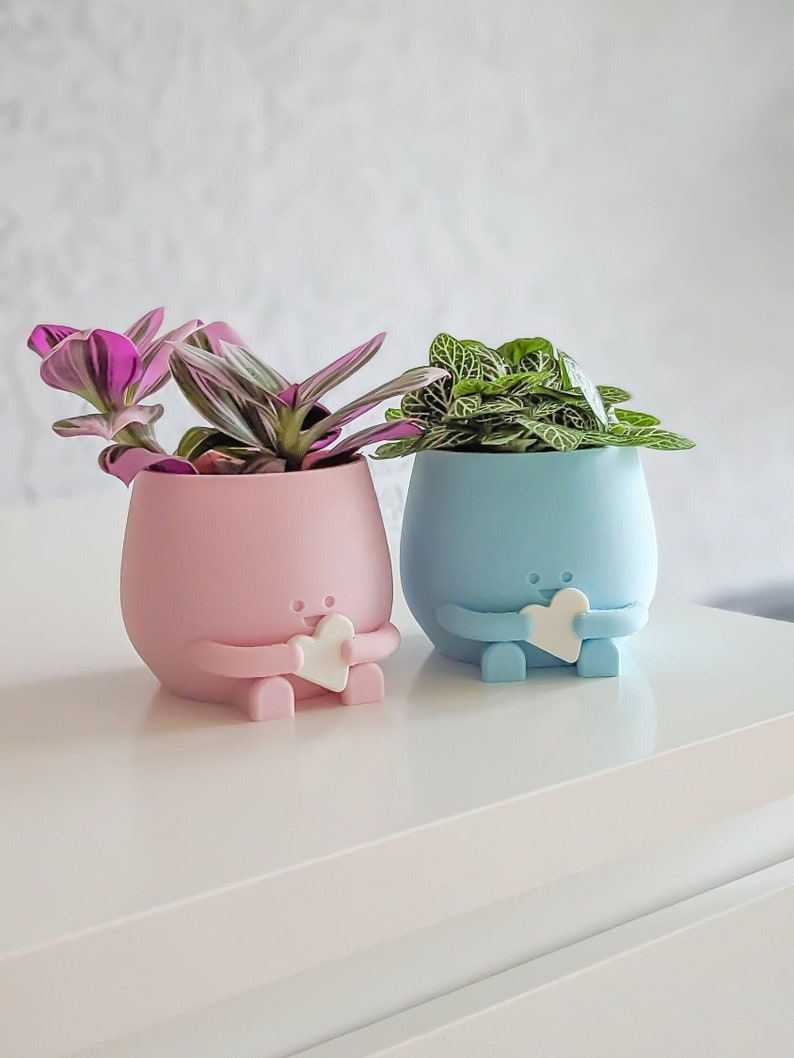 Babyshower gift idea planter pots happy plant pot with heart in its hand blue and pink baby colors plant pots