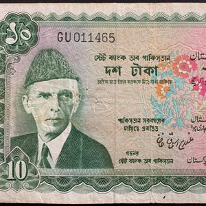 May include: A ten Pakistani rupee banknote featuring a portrait of Muhammad Ali Jinnah. The note has green and pink hues, with floral designs and text in Urdu and English. The serial number is GU011465.