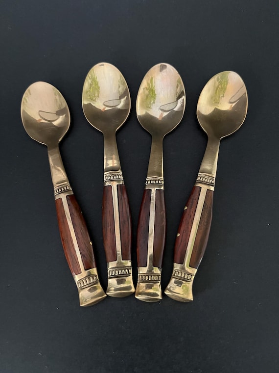 Set of 4 hand-forged brass-and-rosewood Thai folk spoons that double as wall-worthy kitchen art — zero mass-produced vibes.