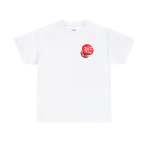 May include: White t-shirt featuring a red button graphic with the word "PUSH" in white. The button has a metallic silver base. The shirt is a classic crew neck style.
