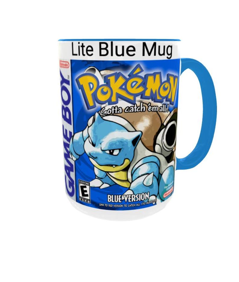 May include: A ceramic mug with a bright blue handle and rim, featuring a graphic print of the Pok&eacute;mon Blue Version Game Boy game box art. The design includes the Pok&eacute;mon logo, the character Blastoise, and the text Lite Blue Mug at the top.
