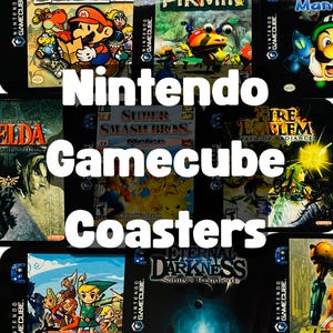 May include: A collection of square coasters featuring various Nintendo GameCube video game cover art, including titles like Paper Mario, Pikmin, Luigi's Mansion, The Legend of Zelda, Super Smash Bros. Melee, Fire Emblem, and Metroid Prime.