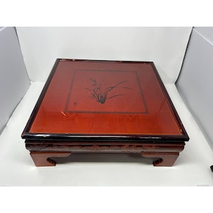 May include: A set of three ceramic mugs with a speckled, matte finish. The mugs are in shades of cream, light gray, and dark gray. Each mug has a simple, minimalist design, perfect for coffee or tea.