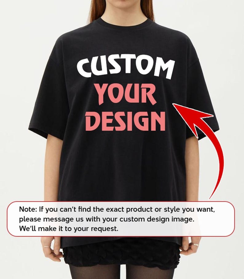 A person wearing a black t-shirt with the text "CUSTOM YOUR DESIGN" printed on it.