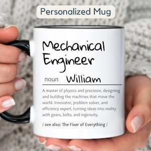 Puede incluir: Taza de cerámica blanca con borde y asa negros. La taza tiene texto negro que dice "Mechanical Engineer noun William A master of physics and precision, designing and building the machines that move the world. Innovator, problem solver, and efficiency expert, turning ideas into reality with gears, bolts, and ingenuity. / see also: The Fixer of Everything /"