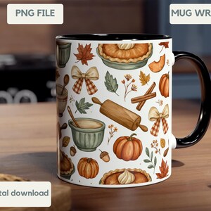 May include: A white ceramic mug with a black handle and rim, featuring a repeating pattern of autumn-themed illustrations including pumpkins, pies, rolling pins, mixing bowls, cinnamon sticks, acorns, leaves, and plaid bows.
