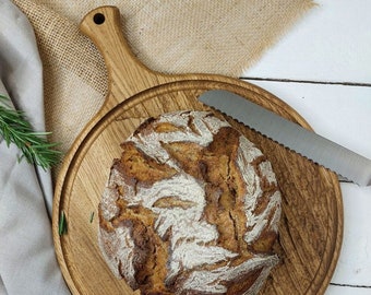 Premium oak board, artisanal bread serving platter, elegant circular bread cutting board, gourmet serving wheel, stylish baking accessory