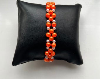 Weiße Perle und orange Armband