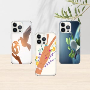 May include: Three iPhone cases with different designs. The first case features a white dove with an olive branch, the second case features a hand making a peace sign with flowers, and the third case features a white dove perched on a branch with blue and white clouds in the background.