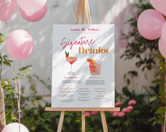 Puede incluir: Un letrero blanco sobre un caballete de madera muestra las palabras "Signature Drinks" en una fuente cursiva. Se presentan dos ilustraciones de cócteles, junto con los nombres e ingredientes de las bebidas. Globos rosas y vegetación en el fondo.