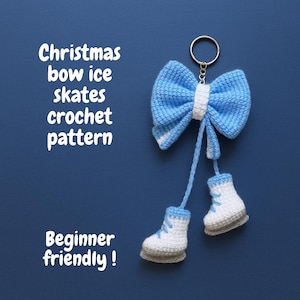 May include: A blue crochet bow keychain with white accents and two miniature ice skates. The keychain has a silver ring and the text "Christmas bow ice skates crochet pattern" and "Beginner friendly!" on a blue background.