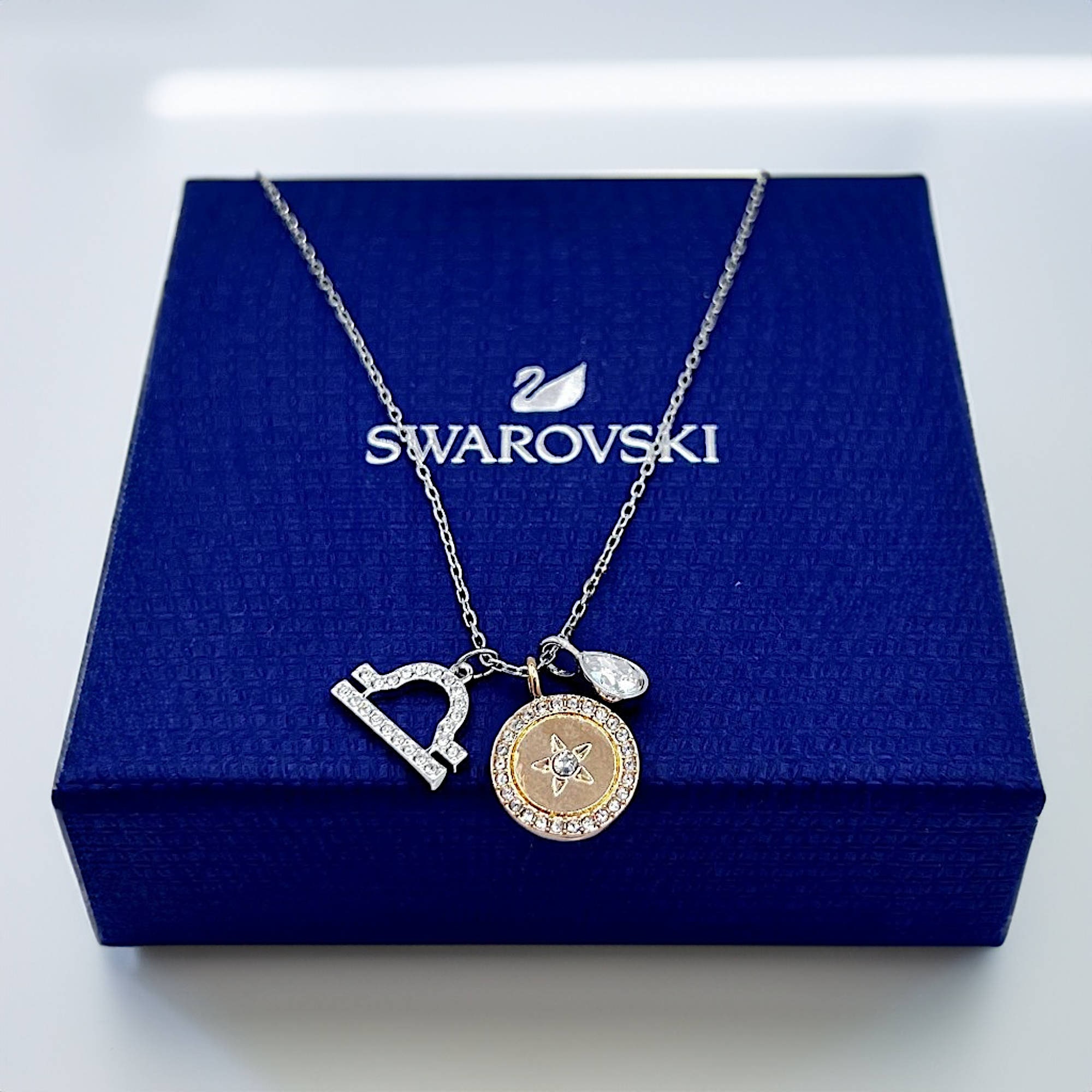 Swarovski libra necklace best sale