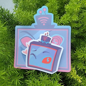 Puede incluir: Un televisor de dibujos animados azul y rosa con un ojo guiñando y una antena roja. El televisor está rodeado de un marco azul y rosa con un contorno blanco.