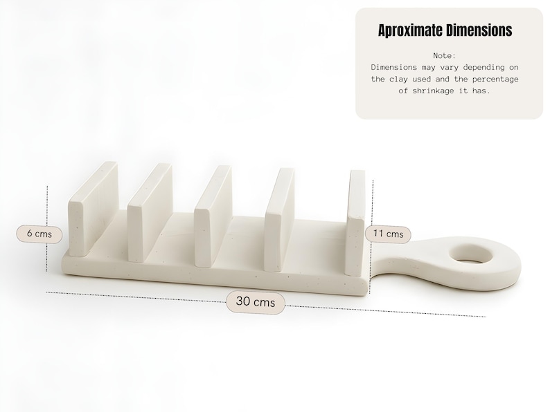 May include: A cream-coloured ceramic utensil holder with four vertical dividers and a handle. The holder is approximately 11 cm tall, 6 cm wide, and 30 cm long. The text "Aproximate Dimensions" is visible.