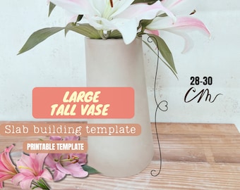 May include: A tall, light-colored vase holding white and pink lilies. The vase is approximately 11-12 inches tall. Text on the image reads "LARGE TALL VASE" and "Slab building template".