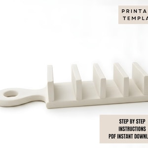 May include: A cream-coloured template holder with a handle and five vertical dividers. The holder has a smooth, matte finish. Text on the image reads "PRINTABLE TEMPLATE" and "STEP BY STEP INSTRUCTIONS PDF INSTANT DOWNLOAD."