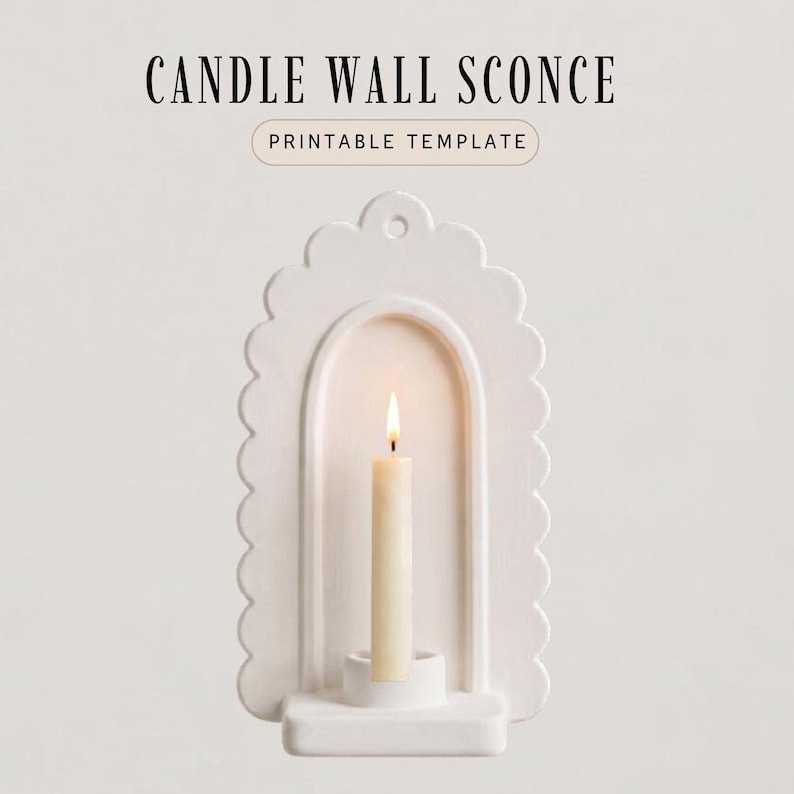 a white candle wall sconce with a lit candle inside, creating a warm and cozy atmosphere.