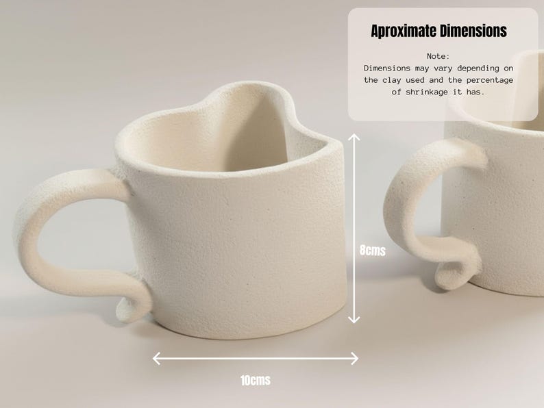 May include: Off-white ceramic mug with a heart-shaped top and a curved handle. The mug is approximately 8 cm tall and 10 cm wide. The text on the image says "Approximate Dimensions".