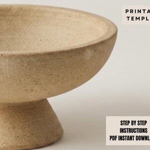 a ceramic bowl with a simple, minimalist design.