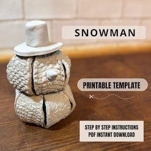 May include: A small, off-white snowman sculpture with a top hat and a carrot nose. The snowman is made of textured material and is segmented into three parts. Text on the image reads "SNOWMAN" and "PRINTABLE TEMPLATE".