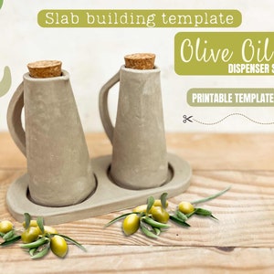May include: Printable template for a slab building project to create a set of olive oil dispensers. The template shows two gray ceramic bottles with cork stoppers and a gray ceramic tray. The bottles have a textured surface. The tray has a rounded edge. The template is surrounded by olive branches with green olives.