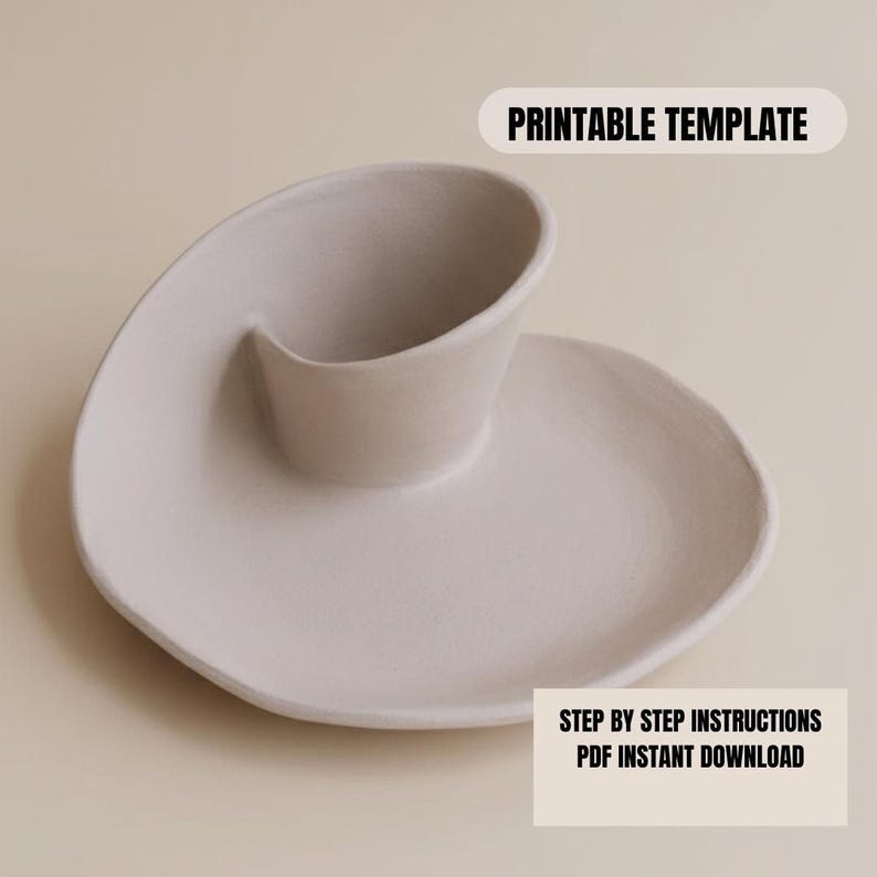 a white ceramic dish with a curved shape, placed on a light-colored surface.
