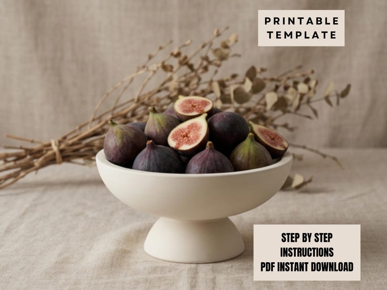 a white bowl filled with sliced figs, placed on a beige cloth. The bowl is positioned on a table, with a bunch of dried branches or twigs nearby. The image also includes a "PRINTABLE TEMPLATE" label and a "STEP BY STEP INSTRUCTIONS" label, suggesting that the image is a template for creating a similar arrangement.