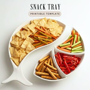 May include: A white ceramic snack tray with three separate sections, filled with tortilla chips, vegetable sticks, breadsticks, and red bell peppers. The tray has the text "SNACK TRAY PRINTABLE TEMPLATE" at the top.