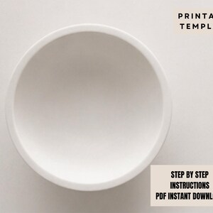 a white bowl placed on a white background.