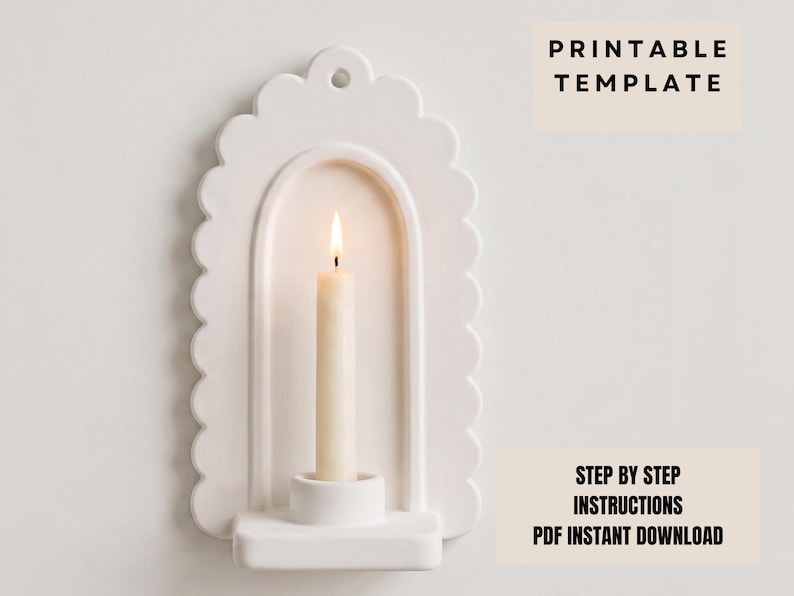 a white candle holder with a lit candle inside, set against a plain white background.