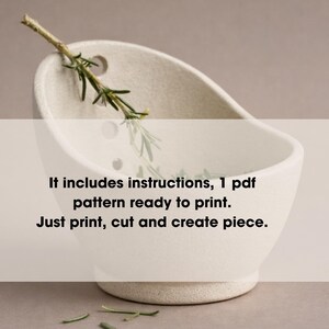a white ceramic bowl with a sprig of greenery inside, accompanied by text that provides instructions for creating a piece of art using the provided pattern.