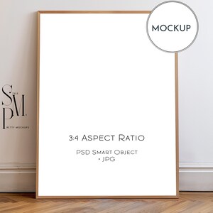 May include: A gold-framed mockup of a blank poster with the text "MOCKUP" in a circle in the top right corner. The poster is on a wall with white trim and a wood floor. The text "3:4 ASPECT RATIO" is below the poster, followed by "PSD SMART OBJECT + JPG".