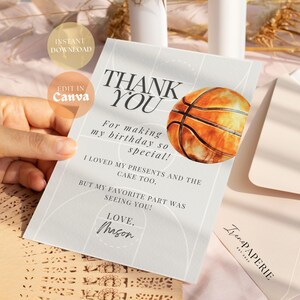 May include: A thank you card with a basketball graphic. The card has a white background with gray lines and text that reads "Thank You" in black. The text says "For making my birthday so special! I loved my presents and the cake too. But my favorite part was seeing you! Love, Mason".
