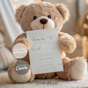 May include: A soft, tan teddy bear clutching a baby shower invitation. The invitation features the words "Little piece of heaven is on the way!" and "He or She". The invitation also has the text "Instant Download" and "Edit in Canva".