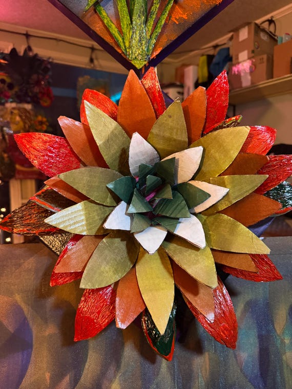 Sculptural painting of whimsical flower