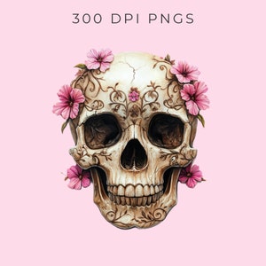 Pode incluir: Uma caveira branca com desenhos florais intrincados e flores cor-de-rosa em torno do topo. A caveira tem um design detalhado e esculpido e um sorriso cheio de dentes.