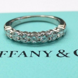 Tiffany & Co. Platinum Embrace .57ct Diamond 3mm shared setting wedding band 7.5