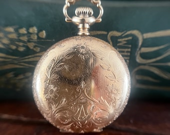 Antique working mechanical Waltham pocket watch with gold filled case