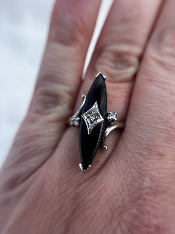 Vintage onyx, diamond, and 14k white gold ring