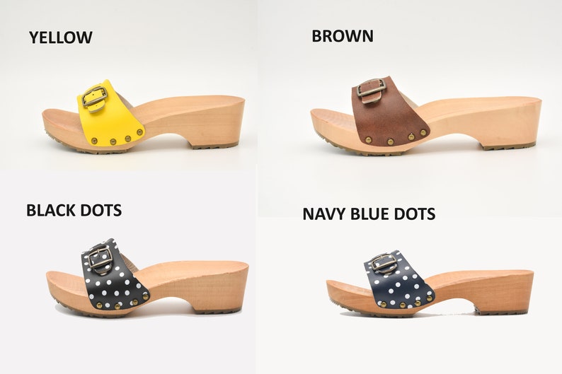 May include: Four pairs of wooden platform sandals with a buckle closure. The sandals are shown in four different colors: yellow, brown, black with white polka dots, and navy blue with white polka dots.