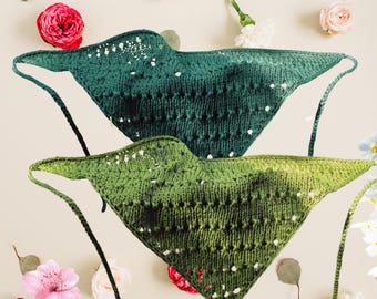 May include: Two knitted shawls, one in a deep teal and the other in a gradient of greens, are displayed. The shawls have a triangular shape with a delicate openwork pattern and ties. The text "Relaxing Weekend Knit" and "Easy Knit Studio" are visible.