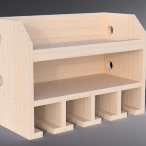 Pode incluir: Uma prateleira de parede de madeira clara com cinco compartimentos de armazenamento e uma prateleira superior. A prateleira tem dois orifícios redondos na frente e no lado.