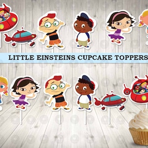 May include: A set of 10 Little Einsteins cupcake toppers featuring the characters from the show. The toppers include the characters Leo, Annie, June, and Quincy, as well as the rocket ship. The toppers are printed on white cardstock and are perfect for adding a touch of fun to your Little Einsteins party.