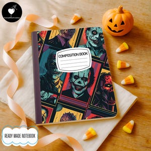 May include: A composition notebook with a cover featuring a collage of zombie illustrations in a colorful, comic book style. The notebook has a label that reads "COMPOSITION BOOK". Candy corn and a carved pumpkin are scattered around the notebook on a wooden surface. The notebook is labeled "READY MADE NOTEBOOK".