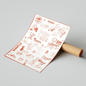 Peut inclure: Une affiche blanche ornée d'illustrations rouges de monuments et d'icônes françaises, dont un café, la Tour Eiffel et des instruments de musique. L'affiche est enroulée autour d'un tube en carton brun.