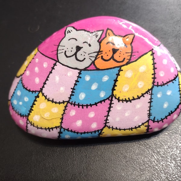 Cute cat kitten under blanket painted rock