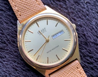 Early 2000s Sharp Quartz Watch. Gold tone. Retro Vintage. New Rubber Strap, Gold Dial. Retro Modernist Design, Day Date, New Battery.