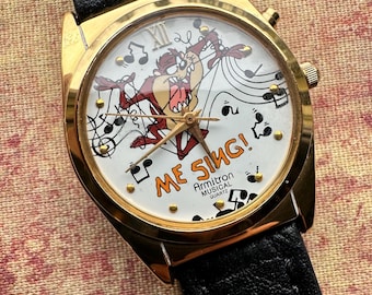 1994 Vintage Looney Tunes Collectible Watch. Armitron Musical Quartz Watch features Tasmanian Devil - plays classic Looney Tunes Theme song!