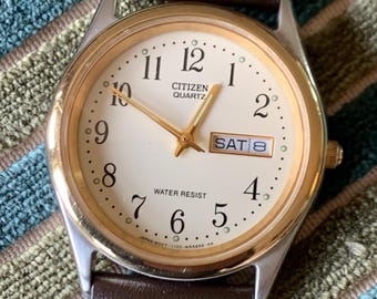 Citizen Quartz Watch Two-Tone, Cream Dial in Excellent Condition - Barely worn, new battery, runs & keeps time well. New Leather Strap. 36mm