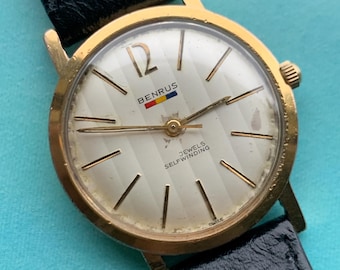 Late 1950s Benrus 7001 Citation Automatic. 10K Gold Plated in good working condition. Stick Indices Ribbed Dial. Self-winder w/vintage strap